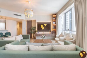 Luxury Apartment, Balcony, Marina View | Living area | 65-inch Smart TV with satellite channels - Marina Torch 45th Floor Sea Skyline View (Dubai)