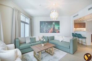 Luxury Apartment, Balcony, Marina View | Living area | 65-inch Smart TV with satellite channels - Marina Torch 45th Floor Sea Skyline View (Dubai)