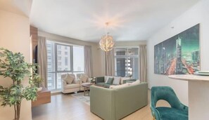 Luxury Apartment, Balcony, Marina View | Living area | 65-inch Smart TV with satellite channels - Vogue | Torch Tower near Dubai Marina Mall | JBR (Dubai)