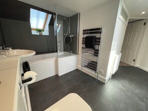A modern bathroom with a glass-enclosed shower, a white sink, and a towel rack. - Forth, seaside 3 bed apartment, stunning views, convenient, central location , (Pittenweem)