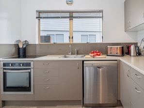 Fridge, dishwasher, coffee/tea maker, toaster