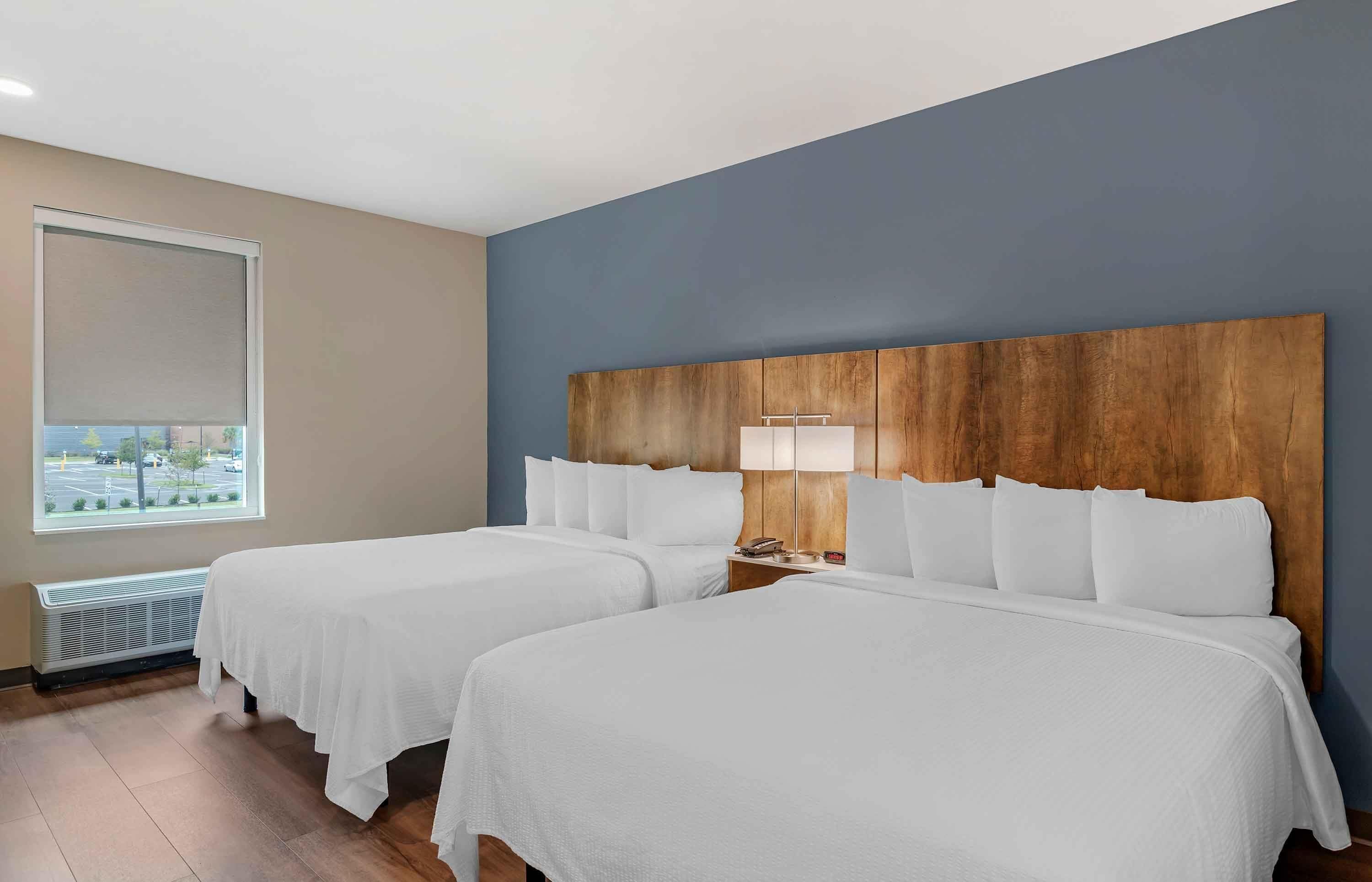 Standaard studio, 2 queensize bedden, niet-roken, koelkast & magnetron | Luxe beddengoed, een bureau, verduisterende gordijnen