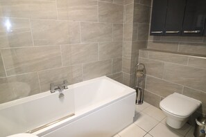 Shower, towels, soap, toilet paper