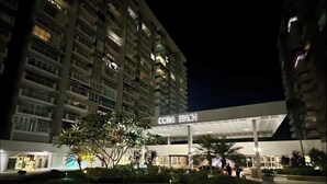 A multi-story hotel with a sign reading "CORAL BEACH" at the entrance. - Apartment with Sea View in Isla Verde (Carolina)