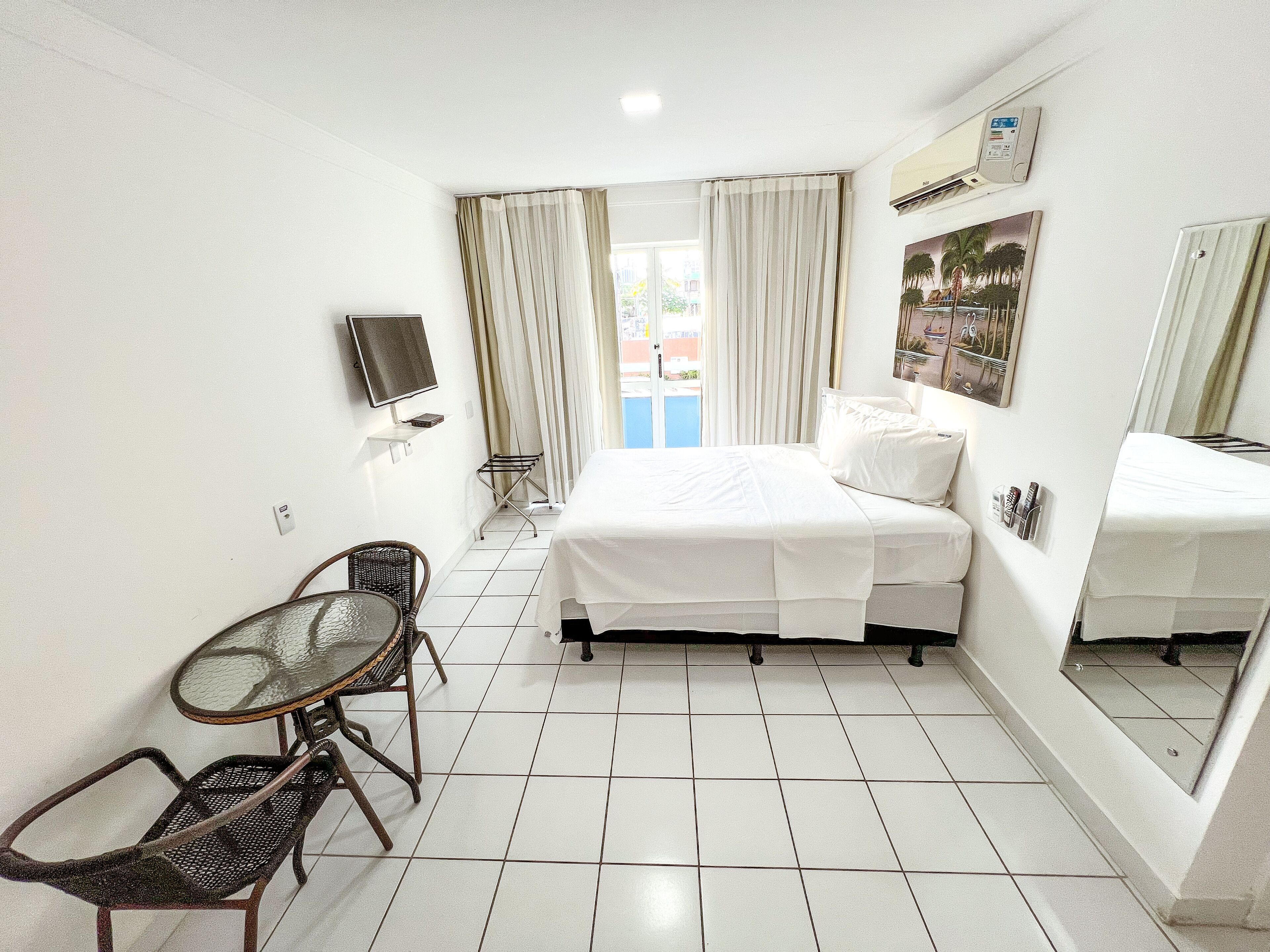 Quarto quádruplo | Cofres nos quartos, cortinas blackout, berço de viagem