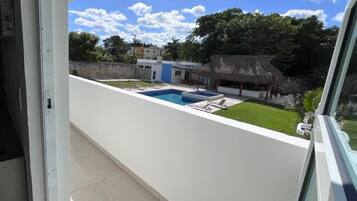 Standard Room, 1 Queen Bed, Balcony, Pool View | Terrace/patio