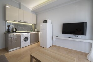 Fridge, coffee/tea maker, toaster, cookware/dishes/utensils