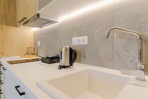 Fridge, microwave, toaster, cookware/dishes/utensils