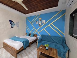 Suite, Garden View | 1 bedroom, desk, laptop workspace, free WiFi