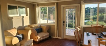 Charming lakefront 3BR 3BA house w/ EV chg in heart of Mt. Dora. Nature abounds.