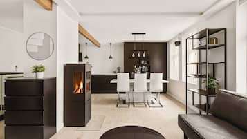 Een televisie, een open haard en een stereo