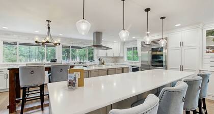 Spacious home with indoor heated pool, volley ball court, and is dog-friendly