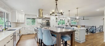 Spacious home with indoor heated pool, volley ball court, and is dog-friendly