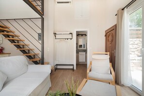 TV, fireplace - Apartment 'Stathis Suite' with Sea View, Wi-Fi and Air Conditioning (Exanthia)