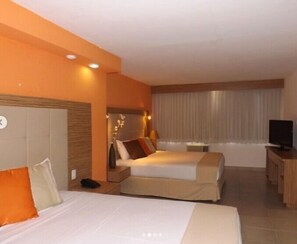 Standard Quadruple Room, Resort View | In-room safe, laptop workspace, iron/ironing board, free WiFi - Hippocampus Vacation Club (Pampatar)
