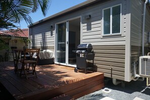 Outdoor dining - Private, Peaceful, Cosy Tiny House with a pool, close to everything. (Mango Hill)