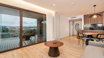 Family Villa | Living area | 43-inch Smart TV with satellite channels