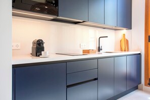 Fridge, microwave, dishwasher, coffee/tea maker