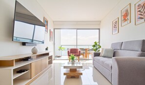 Appart'hôtel Deluxe, balcon, vue baie | Coin séjour