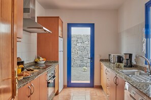 Fridge, microwave, dishwasher, coffee/tea maker