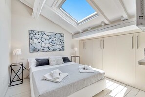 2 quartos, ferros/tábuas de passar roupa