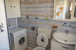 Shower, jetted tub, hair dryer, bidet