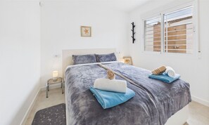 2 dormitorios, tabla de planchar con plancha, wifi gratis y ropa de cama