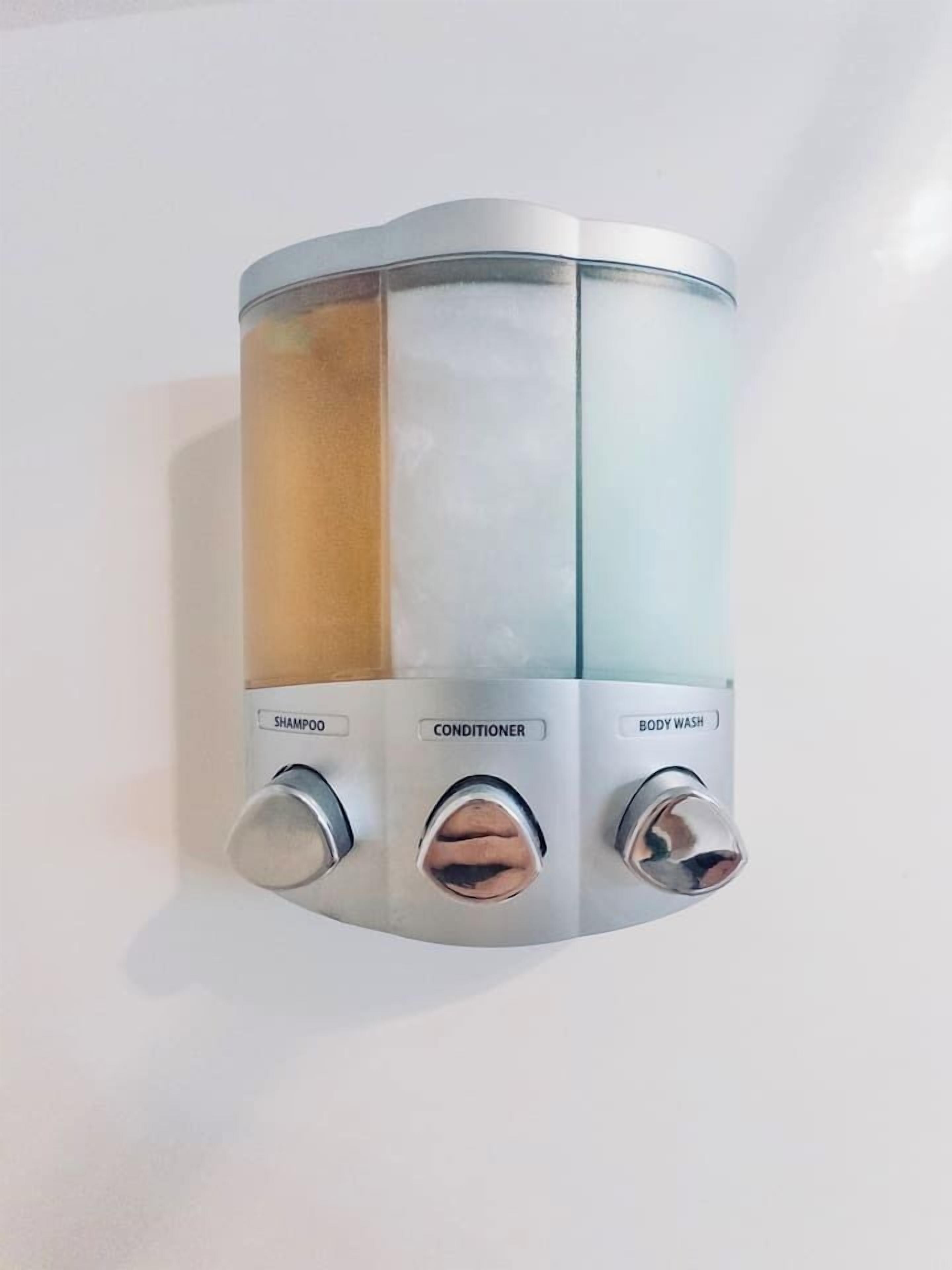 A wall-mounted dispenser with three compartments labeled shampoo, conditioner, and body wash.