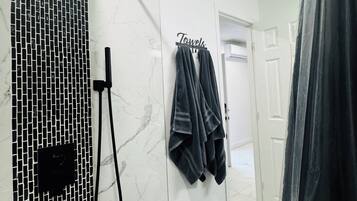 Hair dryer, towels, soap, toilet paper