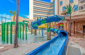 A water park area with slides and play structures. - Ocean Reef 702 (Myrtle Beach)