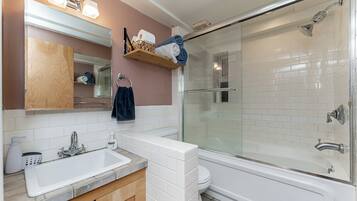 Hair dryer, towels, soap, toilet paper