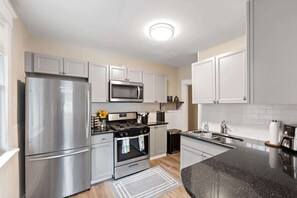 Fridge, microwave, oven, coffee/tea maker