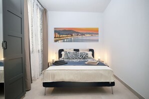 1 dormitorio, tabla de planchar con plancha, wifi