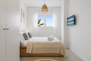 2 habitaciones, tabla de planchar con plancha, wifi y ropa de cama