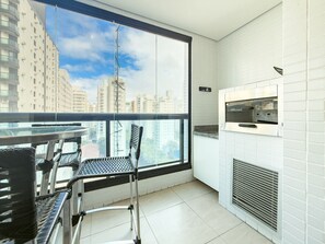 Apartamento | Restaurante al aire libre