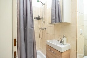 Shower, towels, soap, shampoo