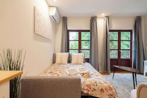 1 dormitorio, tabla de planchar con plancha, wifi gratis y ropa de cama