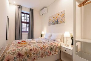 1 chambre, fer et planche à repasser, Wi-Fi gratuit, draps fournis