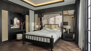 A bedroom with a large bed, dark wood flooring, a decorative headboard, and a mirror above the bed. - Memory Villa 3-bedrooms 1' walking to the beach, Ha Long bay (Thành phố Hạ Long)