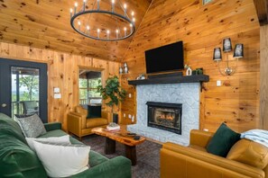 Smart TV, fireplace, foosball, books