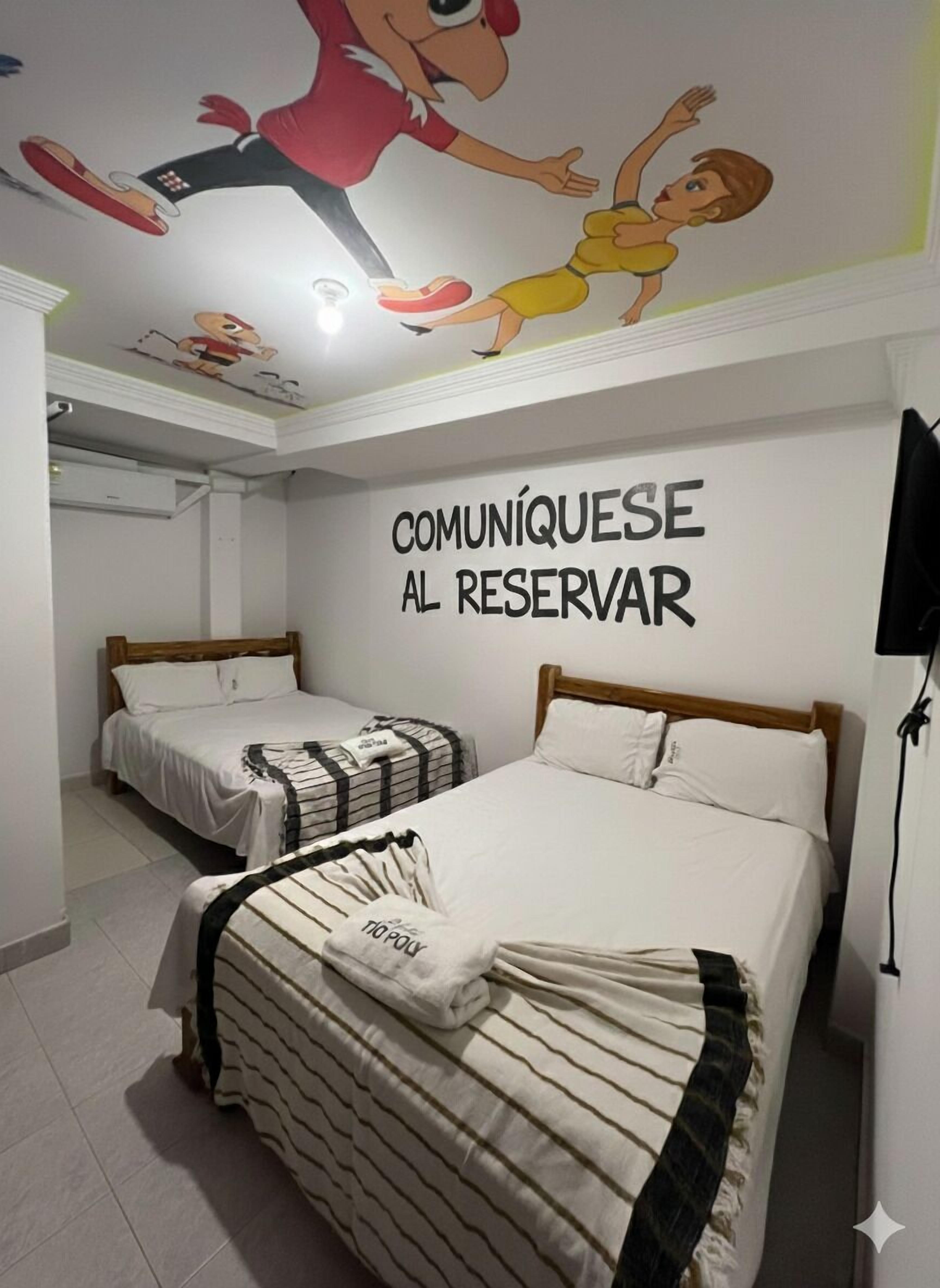 Habitación familiar | Tabla de planchar con plancha, wifi gratis y ropa de cama 