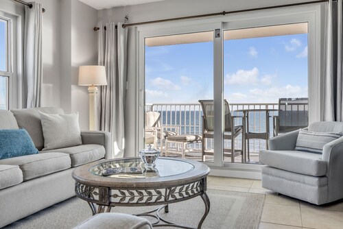Direct oceanfront penthouse 2/2 with gorgeous corner condo views, a heated pool, and garage