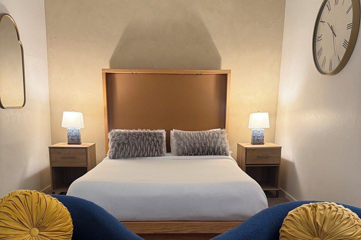 Premium bedding, memory foam beds, desk, laptop workspace