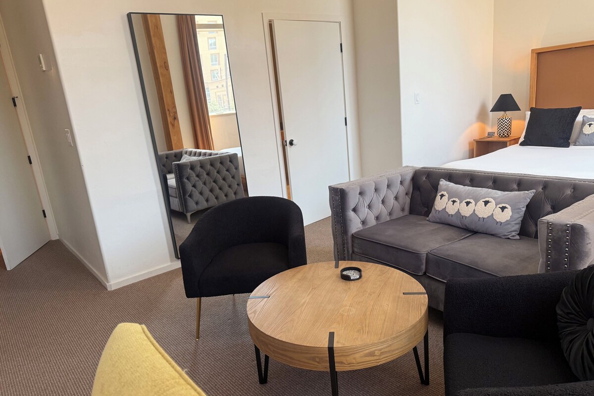 Premium bedding, memory foam beds, desk, laptop workspace