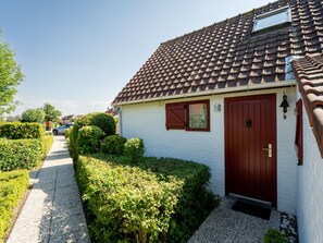 Exterior detail - Polderhuis 9 parking and shared pool by Interhome (De Haan)