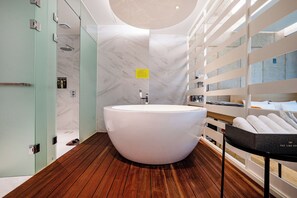 Suite River | Bathroom | Separate tub and shower, hair dryer, slippers, bidet - the line hotel (Yangpyeong)