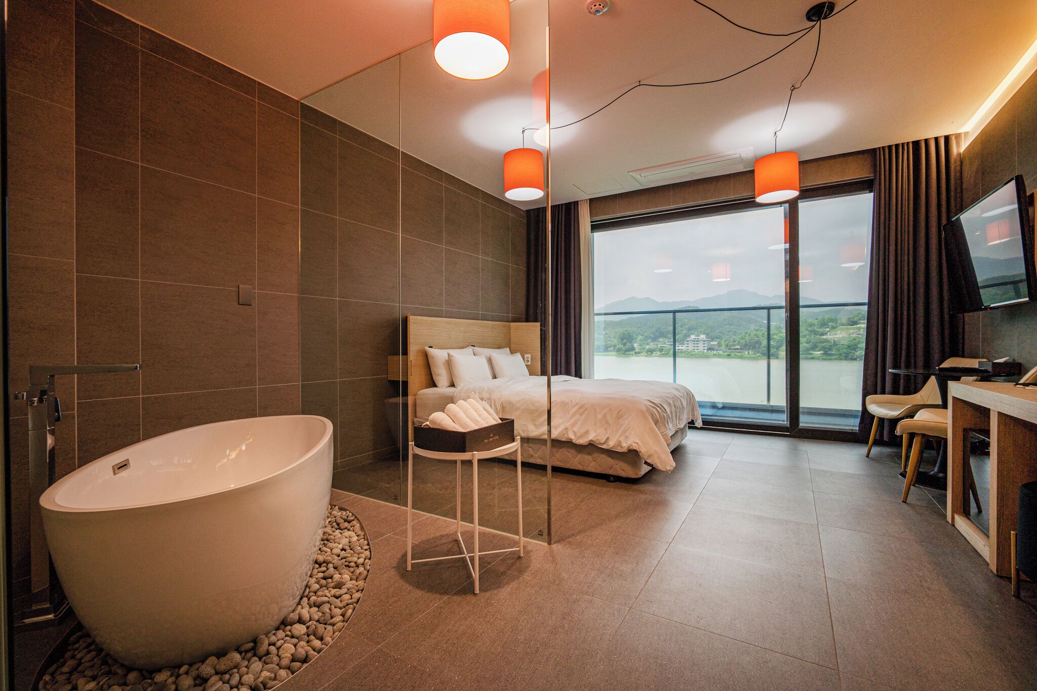 Standard Room, Balcony, Lake View | Living area | TV