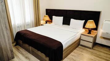 2 habitaciones, tabla de planchar con plancha y wifi