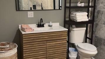 Shower, towels, toilet paper