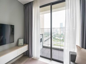 Apartamento, 1 quarto, sacada, vista para a cidade | Área de estar